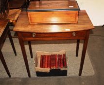 A 19th Century mahogany bow fronted side table fitted with single drawer raised on square section