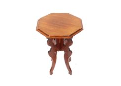 An Edwardian octagonal mahogany topped occasional table and a mahogany tripod wine table