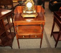 A 19th Century mahogany two tier tray top wash stand, fitted two drawers below raised on ring turned