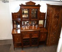 A Victorian rosewood and marquetry inlaid chiffonier, the raised mirrored back having central