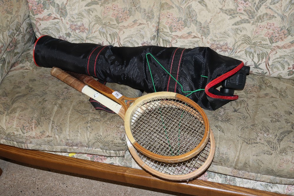 Two vintage tennis rackets and an Optex telescope