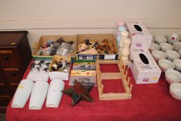 A collection of coat hooks, door knobs, wall pocke