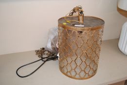 A brass and glass hall lamp of cylindrical shape,