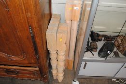 A set of six pine baluster table legs and four pin