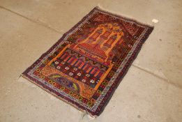 An Eastern wool prayer rug, 137cm x 82cm