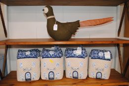 A pheasant door stop and four Langs doorstops