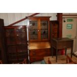 An early 20th Century walnut bureau bookcase, havi