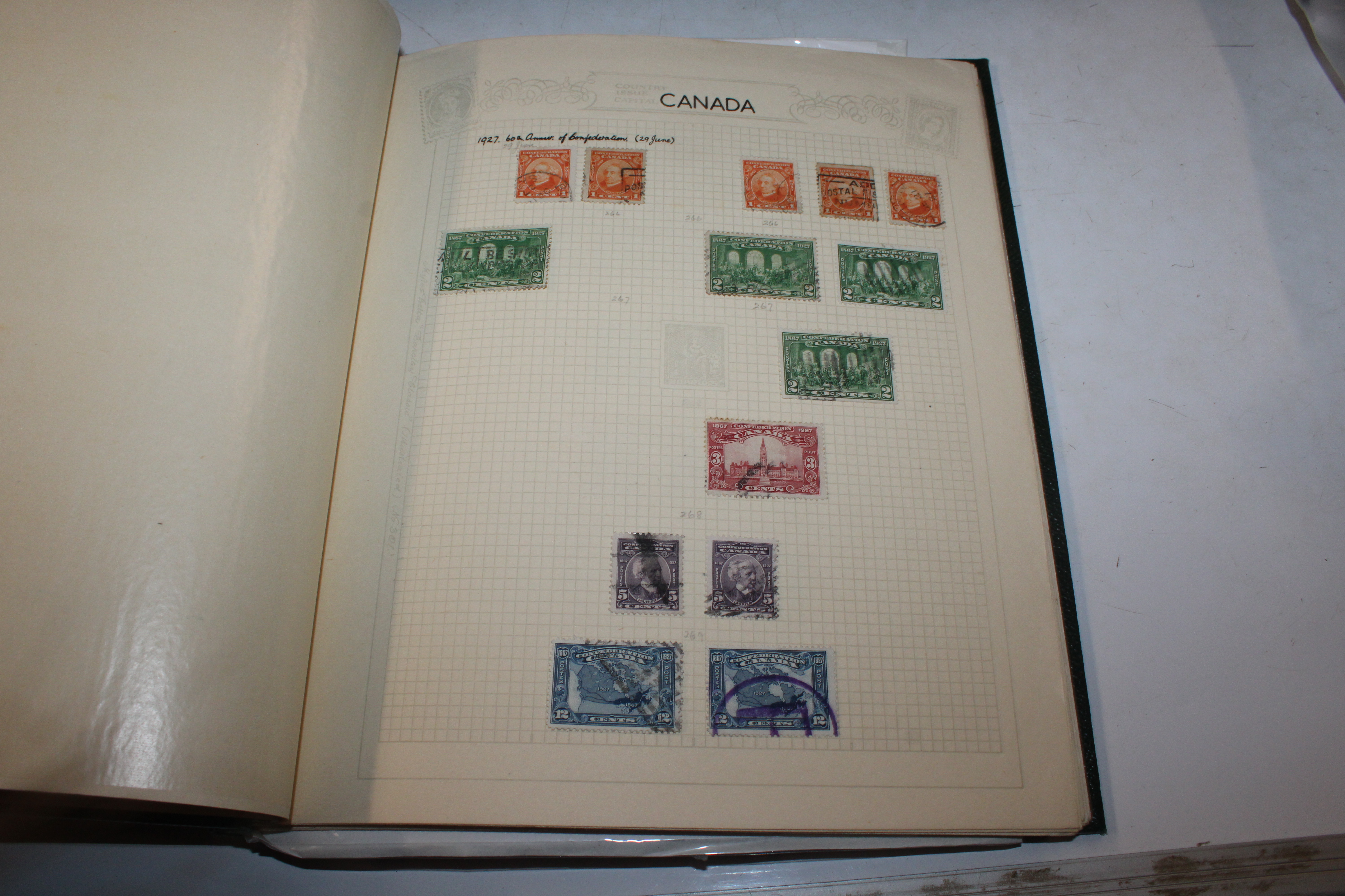 A box containing two early Canadian stamp albums, - Image 11 of 19