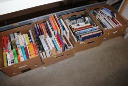 Four boxes of miscellaneous books