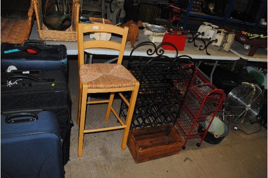 A rush seated chair, a wine rack, wooden storage b