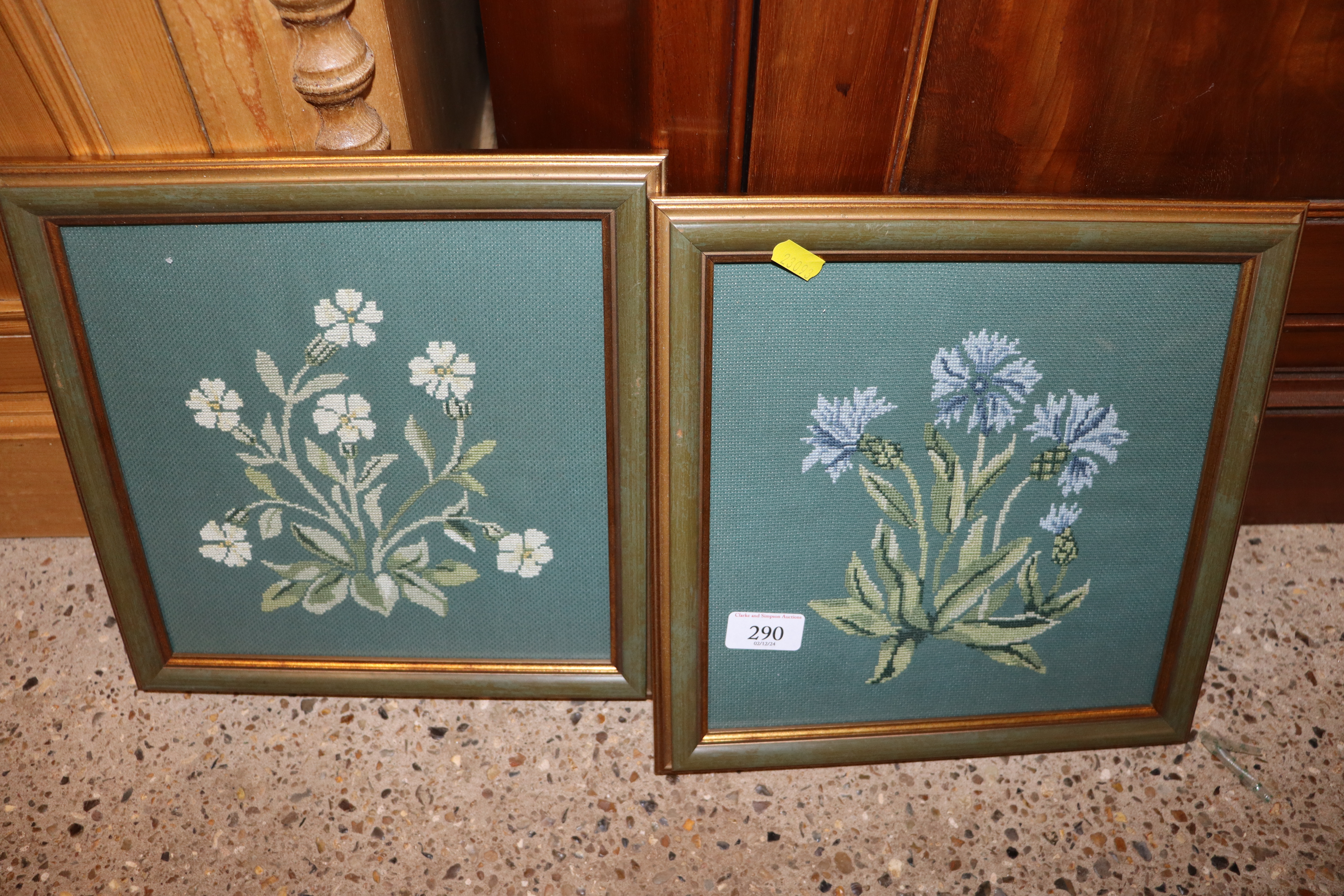 Three embroidered floral pictures