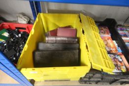 A box of books and filing boxes (crate not included)