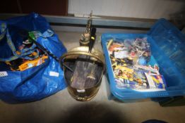 A brass coal scuttle and various fire irons and co