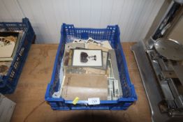 A box of photographs and ephemera