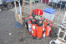 A quantity of various fire extinguisher including