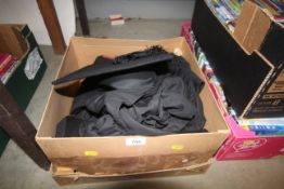 A graduation gown and mortar board