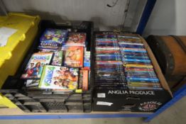 Two boxes of DVDs and PC games