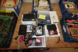 A Song Handicam, Fuji film camera, Cannon digital