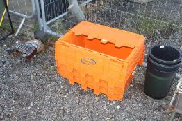 Three plastic storage crates with folding interloc