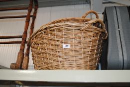 Two wicker log baskets