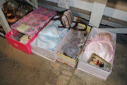 Four boxes containing collector's dolls