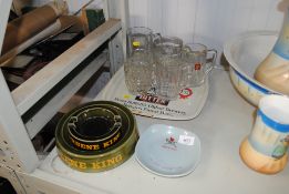 A collection of Wade and other advertising ash tra