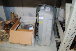 A Tower 8mm projector, sold as collector's item, a