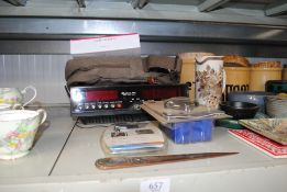 A Binatone digital alarm clock, a DVD writer etc