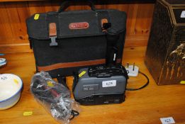 A JVC compact video camera GR-AX2 with bag and accessories