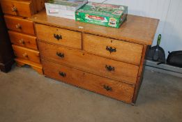 An early 20th Century oak chest fitted two short o