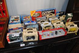 A collection of boxed die cast model vehicles
