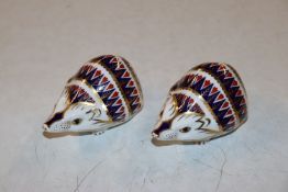 A pair of Royal Crown Derby paperweights in the fo