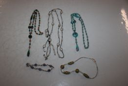 A tray of Venetian style glass necklaces