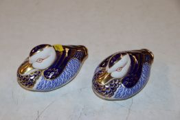 A pair of Royal Crown Derby paperweights in the fo