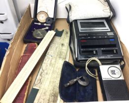 Contents to tray - six items including Amthor boxed testing instrument, vintage slide rule,