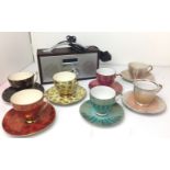 Contents to box - eight items including red-wood cased digital radio and seven cups and saucers -