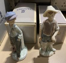 Two Lladro boy figurines 'The Wanderer' No. 05400 and 'Fisher Boy' No.