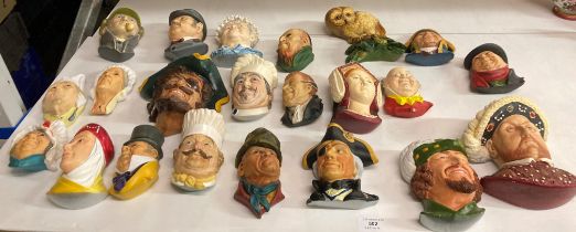 A collection of twenty-two Bossons and Legend Products plaster character heads including Holmes and