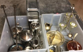Two plastic boxes containing fourteen items of metal ware including five piece stainless steel