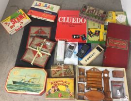 Plastic box containing toys, games and mobile phones etc including Monopoly, Tiddly Winks,
