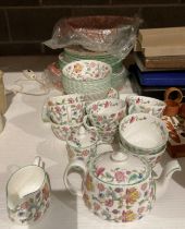 Fifty-two pieces of Minton Haddon Hall patterned dinner service (saleroom location: S1QA09)