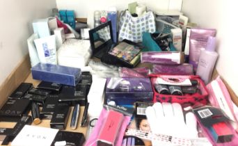 Plastic box containing sixty plus beauty products including makeup, cosmetics,