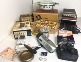 Box containing fourteen items including TCL wind-up torch,