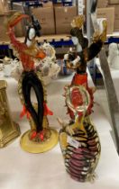 A pair of large glass figurines Spanish Flamenco dancers, each 47cm high and a glass cat,