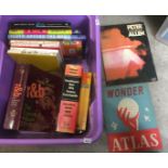 Purple plastic box containing thirteen books including Peter Allen Songbook, Andy Capp,