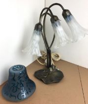 Two items - a three light Art Nouveau style water lily bronze effect lamp (40cm high) with blue and