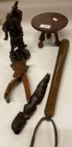 Five pieces of treen - truncheon, oriental figure, bear nutcracker,