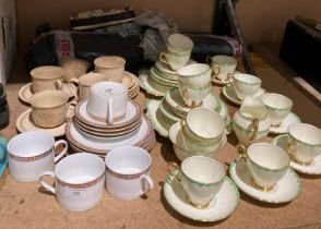 Remaining contents to rack - a Tuscan china plant part tea service,
