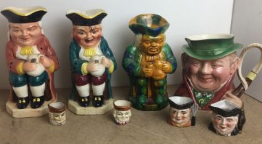 Contents to tray - eight jugs including three Toby jugs two by Burlington 23cm high,