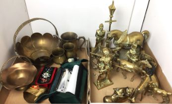 Blue plastic box containing eighteen mainly brass and copper items including heavy horse (20cm